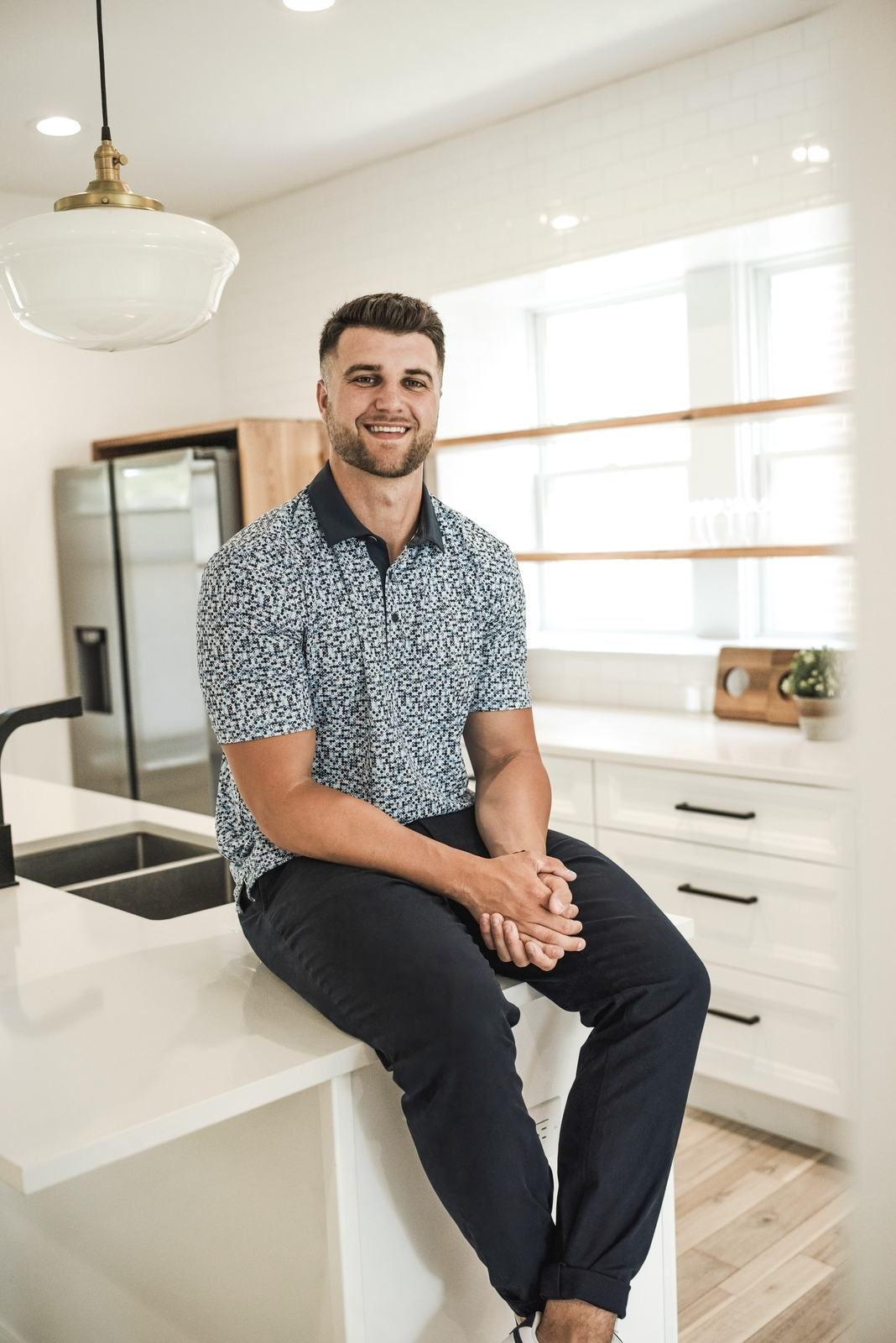Jaden Barr sitting on a kitchen counter