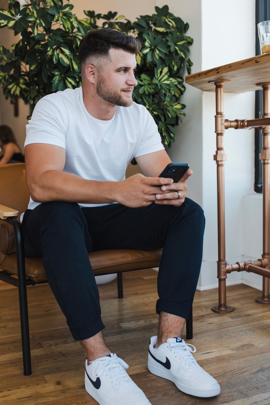 Jaden Barr checking his phone