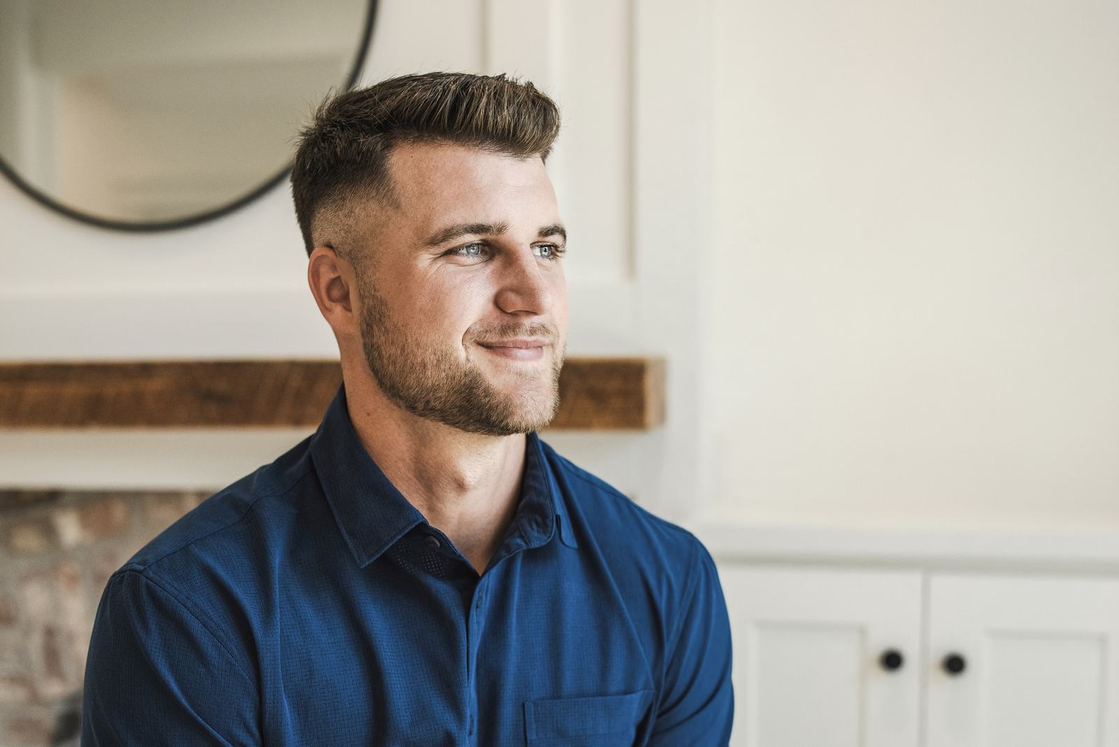 Portrait of Jaden Barr in a navy polo
